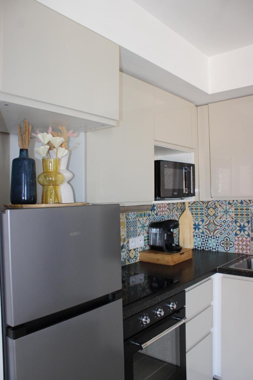 Appartement Elegant Et Lumineux โรแมงวิลล์ ภายนอก รูปภาพ