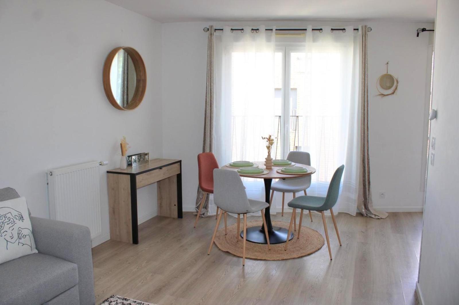Appartement Elegant Et Lumineux โรแมงวิลล์ ภายนอก รูปภาพ