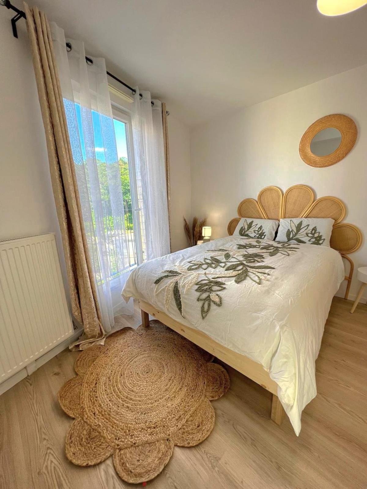 Appartement Elegant Et Lumineux โรแมงวิลล์ ภายนอก รูปภาพ